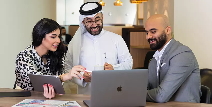 Business man working with Servcorp's team in a 5-star coworking space at Tornado Tower. 